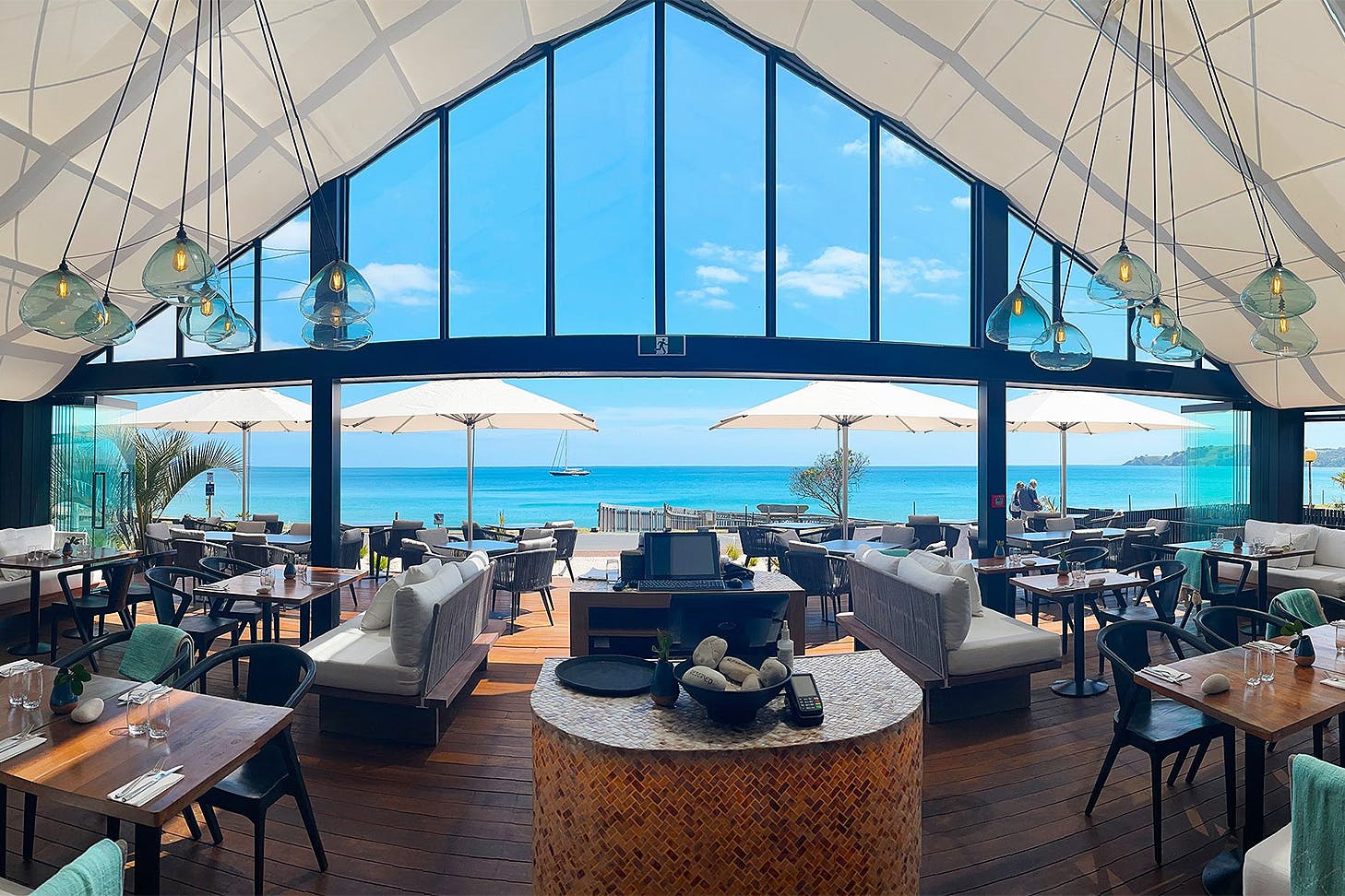 The interior of Ki Māha looks out over the sea.